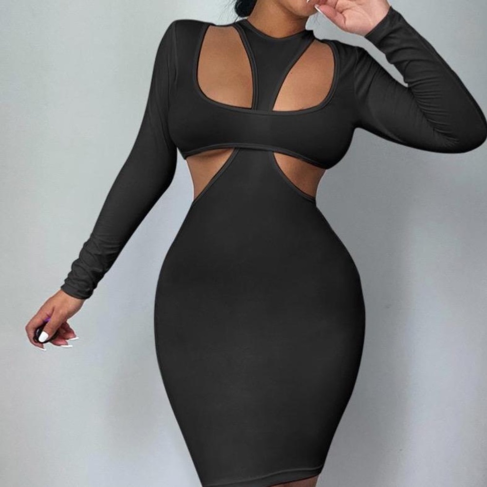 Cut Out Black Dress NWT. Size S left.
